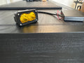 Yellow battery powered Baja headlight (AA batteries)